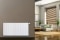 Imaginea prezintă un radiator Viessmann pe peretele unui spațiu de locuit modern.